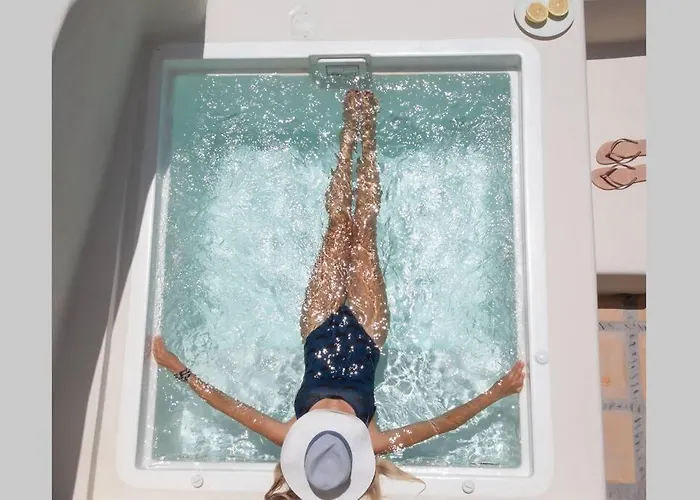 Dionyssos Cave House イア